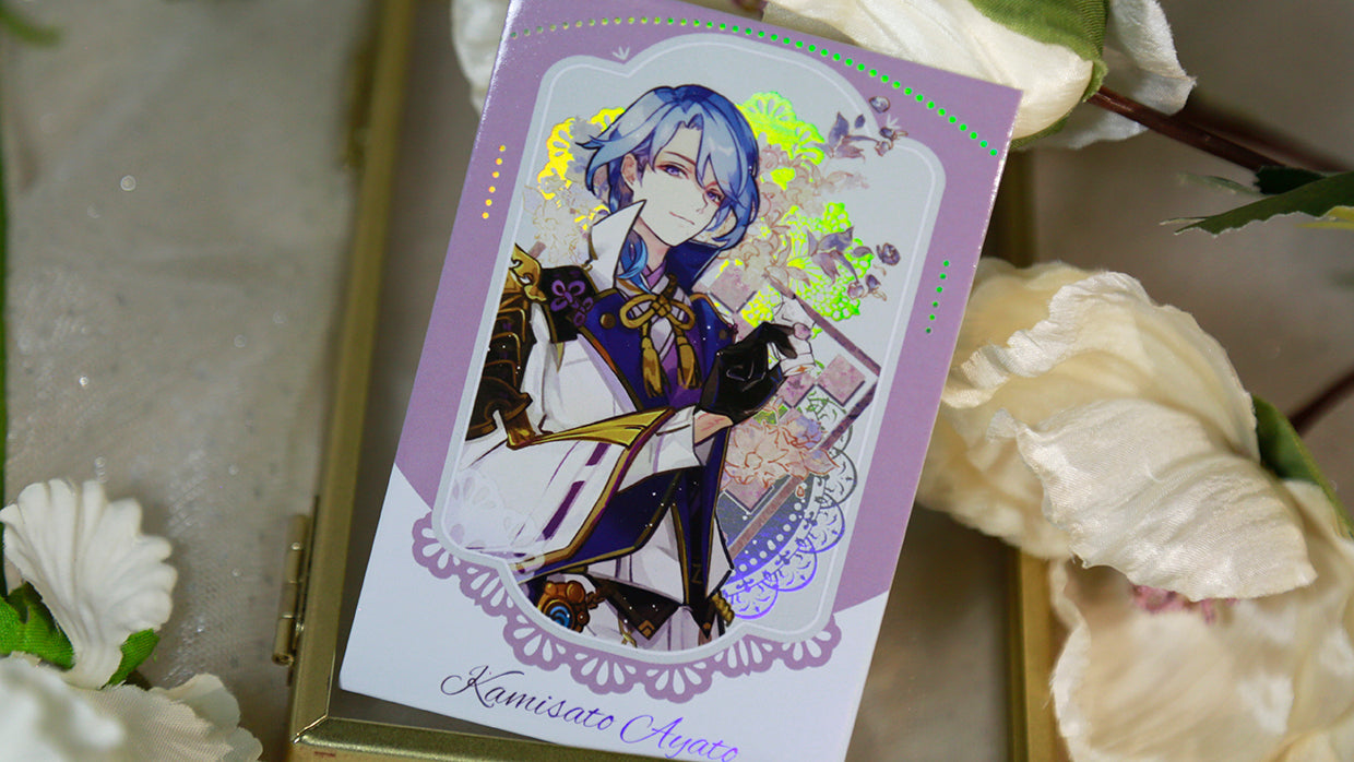 Detail view of Kamisato Ayato glossy photocard with selective holographic floral effects by AO Treehouse.
